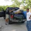 Patrick loading the truck & Bart; ready to go home...@ Ocean Spray Apartments 18.02.04