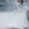Kelly Slater flying out of the wave @ Bathsheba Barbados 02.02.05