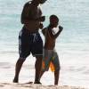 Father & son running on the beach @ Barbados