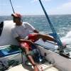 Captain Larry sailing the catamaran of the westcoast of Barbados
