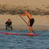 Kirsten taking pics of Arjen stand up paddling @ da Brouwersdam