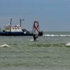 Arjen & a surveyer boat @ da Brouwersdam