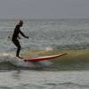 Arjen de Vries SUP surfing a wave @ Nieuw-Haamstede