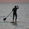 Lifeguard Patrick Bongers paddling out @ Nieuw-Haamstede