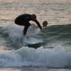 Arjen de Vries taking a wave on his McTavis'h longboard @ Nieuw-Haamstede