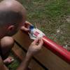 Arjen fixing his airline-damaged SUP board @ Seascape Beachhouse Barbados