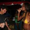 Ianthe & spanish surf photographer Juan Fernandez drinking a shot of Barbados rum