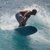 Arjen riding da waves @ Surfers Point Barbados