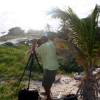 Photographer Chris Welch @ work in the broiling sun @ Silver Sands Barbados