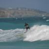 Longboarder riding a long wave 3 Long Beach