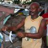 Local fisherman showing a flying fish @ Six Men's Bay Barbados