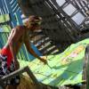 Brian Talma painting the old fisherboat @ Silver Rock Barbados