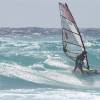 Riding the waves one handed @ Surfers Point