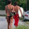 Surfers on the road in search of waves